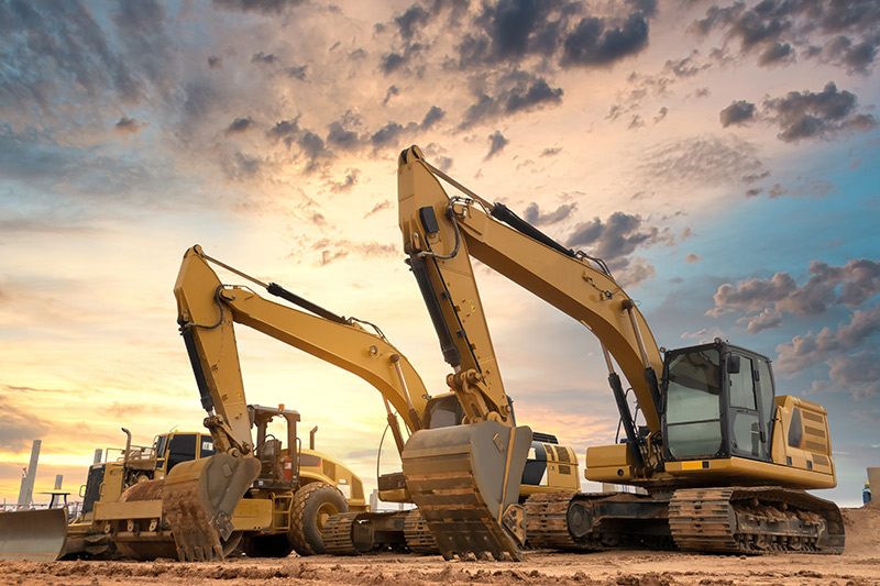 Excavator at construction site เช่ารถตัก